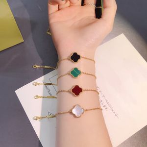 bracelet design luxe bracelets à quatre feuilles femmes et hommes trèfle bracelets à breloques mode tendance fille bijoux classiques perle verte fleur belle