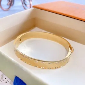 Bracelet de créateur en acier titane et diamant d'eau, en or 18 carats, polyvalent pour un usage quotidien