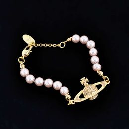 Pulsera de diseñador Viviennr Westwoods Classic 3d Saturn Pearl Pulsera Nana Pulsera Joyería Saturn Pink Pearl Style