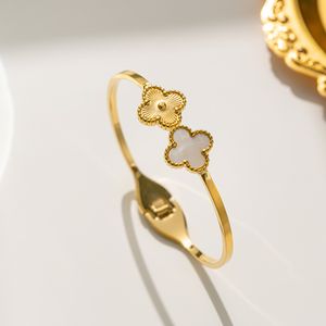 Bracelets de créateurs 4 / quatre feuilles Clover Fashion Brangle Bijoux Bracelet Open-end Bracelet Gold Femmes Bijoux de fête Lady Party 98