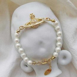 Bracelet de créateur Bracelet haute édition Saturne Pearl Diamond Lumière Luxury Luxury Small Design Sense Hicraft Girl