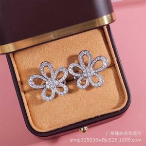 Designer Brand Fashion High Version van vier blad gras oorbellen voor dames nieuwe volledige diamant grote bloemblaadjes zon sieraden