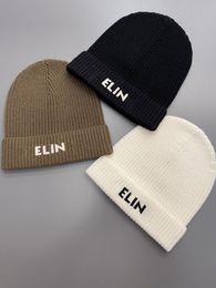 Marca de diseñador Gorro para hombre Gorro para mujer Estilo de otoño e invierno Moda Todo fósforo Logotipo de letra grande Lana Angora Pelo de conejo Gorro de punto