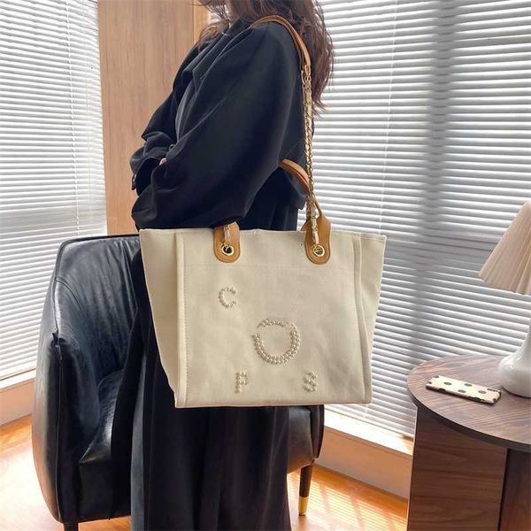 Sac à provisions de marque de designer 2023 nouveau sac à bandoulière messager pour femme fourre-tout de luxe perle grande capacité mode sac à main pour femme en gros