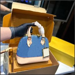 Designer merk schoudertassen vrouwen cross body handbag aimas shell tas met slot tag koppeling tas m23502 m23688
