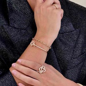 Designermerk Tang Yi Jewelry TFF Teller Key Ring
