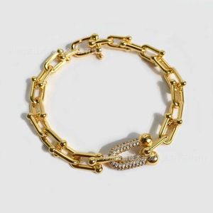 Designermerk TFF Horseshoe Buckle vrouwelijke armband met diamant inleg en U-vormige in elkaar grijpende ring niche-paar armband
