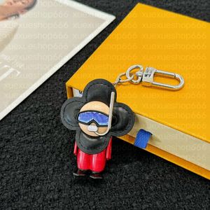 Designer Brand Women Key Wallet Sunflower Snowboard Doll KeyChain Dog Vivi Diver Diver Diver Ladies Key Chain Luxury Brand Paren Tassen Takken Hanger Keychain Charms