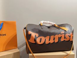 Diseñador de marca para mujer Bolsas de lona Letras marrones Graffiti Bolsas de viaje Marca de lujo Pareja Equipaje Bolsas de aeropuerto Keepall Bolsos Bolsos de hombro Fitness Bolsa de yoga Totes