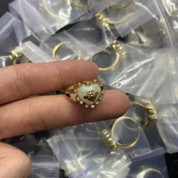 Anillos de joyería de marca de diseñador para mujer oro plateado cobre dedo anillo ajustable mujeres amor encantos suministros de boda accesorios de lujo GR-047