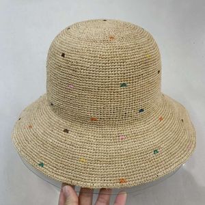 Chapeau de seau de créateur printemps et été Nouveau lafite Grass Fisherman pur à la main de paille tissée à la main