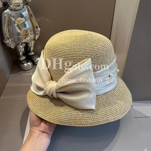 Chapeau de seau de créateur d'été, chapeau de paille de protection solaire pour femmes, chapeaux ajustés de luxe, chapeau de perles, grand nœud papillon, vacances en plein air, voyage, pare-soleil