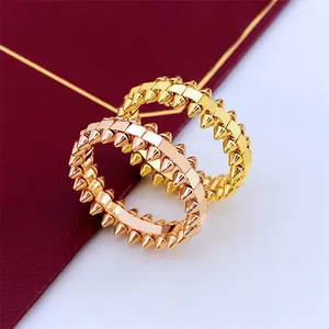 Anillo de bala de diseñador para hombres y mujeres Anillo de oro de 18 quilates de acero inoxidable Anillos de moda de gama alta accesorios de vacaciones de viaje con regalos de joyería de boda de equipo