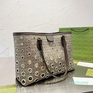 Diseñador -Bolso de compras de lona Bolso de mujer Bolsos de mano Carta de moda de varios tamaños Bolsillo con cremallera Cierre magnético Bolsos de hombro de metal dorado