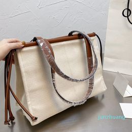 Diseñador -Capacidad Bolsos de compras temperamento Bolsos de mujer Lienzo Geométrico Bolsos de hombro Bolsos de moda Correa de hombro larga Alta calidad