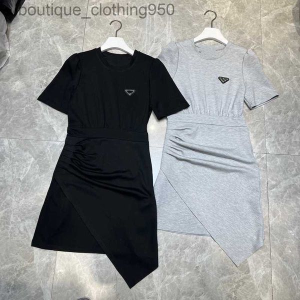 Vestidos casuales de diseñador para mujer vestido de manga corta con dobladillo irregular con encanto femenino cintura delgada y falda envuelta en las nalgas summe