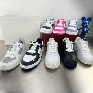 Ontwerper Casual schoenen Luxury merk sportschoenen klassieke mode klinknagels voor mannen dames platschoenen lederen paren b22 casual coaching schoenen