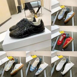 Designer Casual schoenen Maisons Sneakers Men Dames schoenen Splitte effen kleur Cowhide Trainers Suede leer retro sneakers met doos