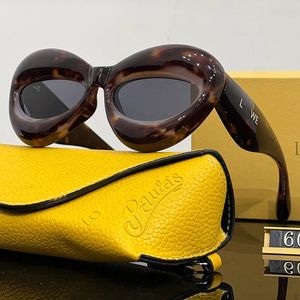 Gafas de sol de ojo de gato de diseñador para mujer Gafas para hombre Gafas protectoras de playa Viajes Gafas de sol Diseño inflable Gafas de sol con caja CYD239073-6