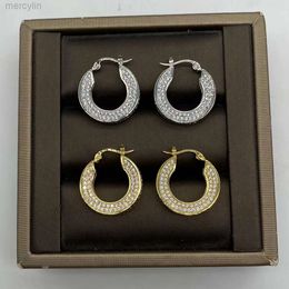 Ontwerper Celieene sieraden Celins Saijia Celi Volledige diamant gouden cirkel oorbellen voor vrouwen met een uniek ontwerpgevoel en geavanceerde Instagram -mode -sfeer