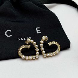 Designer Celine bijoux Cellins Saijia Celis New Peach Heart Half Diamond Pearl Oreilles Souces Cool mignon Fashion Volyme Amour Silver Needle