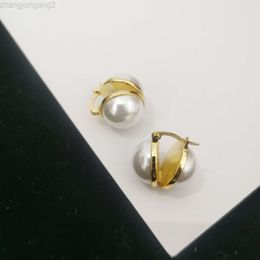 Diseñador Celins Jewelry Cel Style 22 Nuevos pendientes de perlas de doble cara Temperamento de sensación avanzada para mujer Pendientes chapados en oro de latón liso