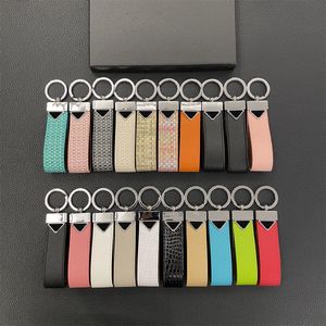 Designer kettingaccessoires P Letter sleutelhangers Merk Klassiek Gevlochten Lychee-patronen Kruispatroon Autosleutelhanger Tassen Unisex Paar Geschenken Lanyards voor sleuteltas