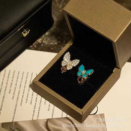 Boucles d'oreilles Van Butterfly de charme de charme de créateur pour femmes Asymétrique en diamant complet avec des femmes