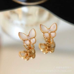 Boucles d'oreilles Van Version Van Version Van pour les femmes avec une coque à nœud papillon Fritillaria blanche Free Free