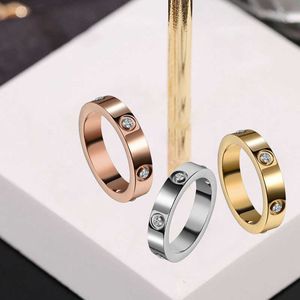 Charme de concepteur en acier inoxydable à vis transversale zircon avec six diamants pour couples Nail complet petit design Ins Carter Temps