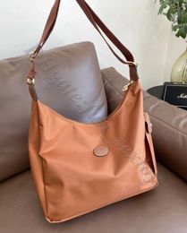 Concepteur Magasin bon marché 90% de réduction sur les sacs de haute qualité de haute qualité Luxury Messenger épaule Hobo Tote Bag Nylon Faye grande capacité Commutant le même crossbody 30hm