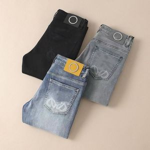 Jeans pour hommes classiques de créateur lettres imprimées jeans de lavage vintage lâche stretch lavage droit résistant à l'usure pantalon décontracté patch rangée supérieure