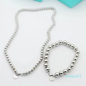 Designer classique en acier titanium en acier simple perle de perles bracelet masculin et festival des femmes cadeaux cadeau d'anniversaire avec boîte-cadeau