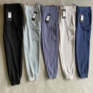 Vêtements de créateurs 23SS La meilleure qualité CP Hommes Femmes Pantalons de sport décontractés d'hiver Pantalons surdimensionnés Pantalon Ladys avec badge Asie Taille M-2XL Style