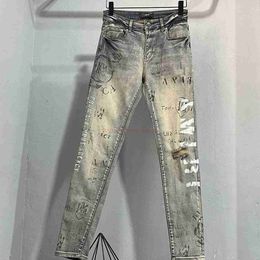 Designer Clothing Amires Jeans Denim Pants 2869 New Amies Fashion Brand Graffiti Letter Printing Washed Old Yellow Hole Stretch Slim Denim Pants for Men Distress