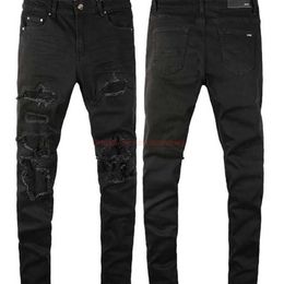 Designerkleding Amires Jeans Denim broek 22 Zwart gewassen gescheurde jeans voor heren met Amies-patches voor afslankende pasvorm Hoogwaardige broek met kleine pijpen voor casual mode