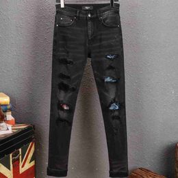 Amires Jeans Denim Pantalons Été Nouveau Noir Amies Trou Slim Fit Jeans Hommes Mode Polyvalent Élastique Leggings En Détresse Ripped Skinny Motocycle Bi