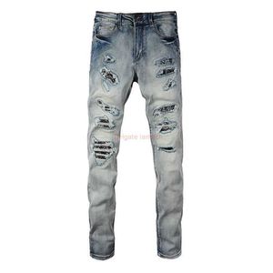 Ropa de diseñador Amires Jeans Pantalones de mezclilla Amies Jeans Hombres High Street Estilo americano Cuchillo Agujeros cortados Gran daño Anacardo Flor Parche Lavado Azul Desgastado Pantalones Dis