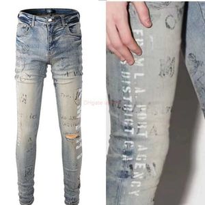 Ropa de diseñador Amires Jeans Pantalones de mezclilla 869 Moda 2022 New Amies Blue New Broken Letter Graffiti Trend Slim Fit Skinny Jeans Moda masculina Piel rasgada desgastada