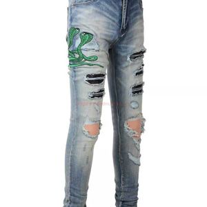 Designer Clothing Amires Jeans Denim Pants Amies Fashion Brand Jeans usés pour hommes avec pantalons à pieds élastiques bleu clair usés avec broderie pliée Snake Label Fash