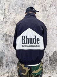 Ropa de diseñador Abrigos casuales Moda Rhude Contraste de color Chaqueta de retazos Cremallera de píldora para hombres Gabardina de calle alta Suelta Deportes Streetwear rompevientos deportivo