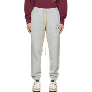 Ropa de diseñador Pantalón casual Rhude high street Trend Marca Hombres Mujeres carta bordado suelto deportivo casual cordón Leggings Streetwear Jogger Pantalones