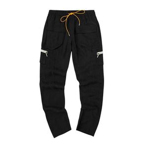 Ropa de diseñador Pantalón casual Roaring Small Eyes Rhude Cobre Amoníaco Terciopelo Píldora Cremallera Bolsa múltiple High Street Monos Pantalones cargo Hip hop suelto al aire libre