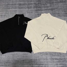 Vêtements de créateurs Sweats à capuche Rhude Style américain Automne Hiver Col montant Demi-fermeture à glissière Lettre Broderie Couture Pull ample pour femme