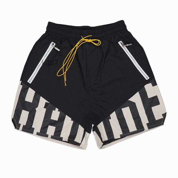 Ropa de diseñador Rhude American High Street Trend Marca Loose Fit Sports Vtg Panel de dos tonos Letra Pantalones cortos de cinco puntos Hombres Parejas Joggers Ropa deportiva HS3Z