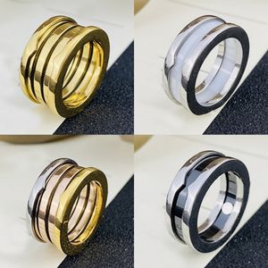 Designer Cluster Spring Rings vrouwen merk keramische ring mannen witte zwarte sieraden zilveren goud nooit vervagen band ringen sieraden klassieke premium accessoires v68
