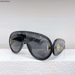 Diseñador Gafas de sol frescas L W40108i Gafas para hombres y mujeres Nuevas lentes de una pieza en forma de ala anti UV400