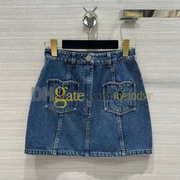 Designer Denim une ligne jupes Sexy creux robe courte rétro bleu Denim robe femmes broderie lettre taille haute jupes