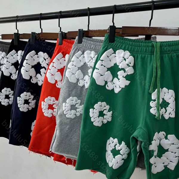 Diseñador Denimtears Hombres y mujeres Moda Ropa de verano Chándales Estilo americano Co Marca Kapok Espuma Impreso Pantalones cortos sueltos Pantalones sanitarios Deportes