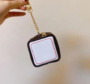 Diseñador Dados Carta Monedero de alta calidad Llavero Accesorios Monedero Llavero PU Patrón de cuero Monedero Hombres Mujeres Llavero Joyería